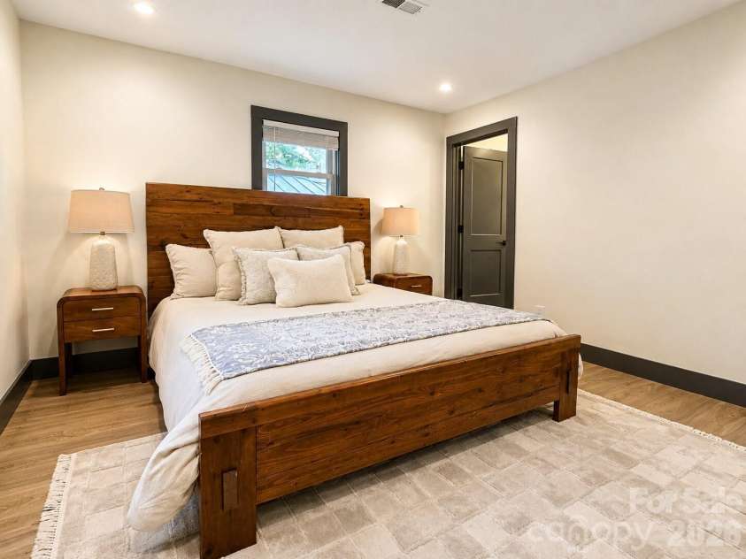 35 Timberview Drive, Arden, NC 28704.  MLS# CAR4373385, YatesRealty ID 29135. Serene primary bedroom