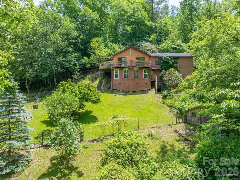 295 Richmond Road, Bakersville, NC 28705.  MLS# CAR4387768, YatesRealty ID 29139. Fenced back yard or pasture area.