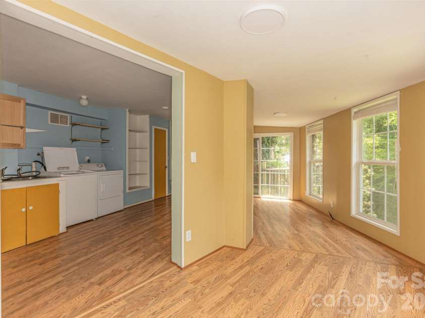 295 Richmond Road, Bakersville, NC 28705.  MLS# CAR4387768, YatesRealty ID 29139. Sunroom and laundry rooms in basement