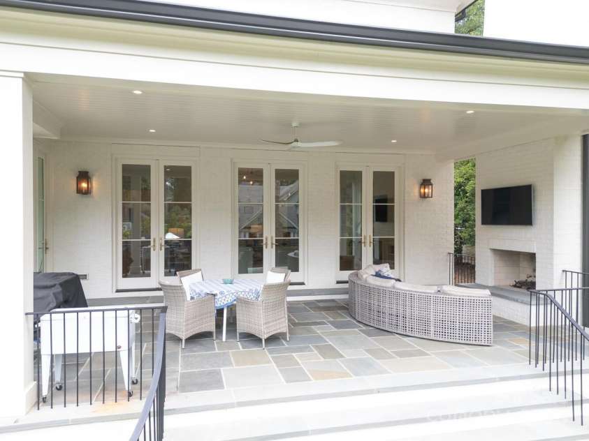 418 Ellsworth Road, Charlotte, NC 28211.  MLS# CAR4276851, YatesRealty ID 29139. Gorgeous, blue stone, covered patio with fireplace