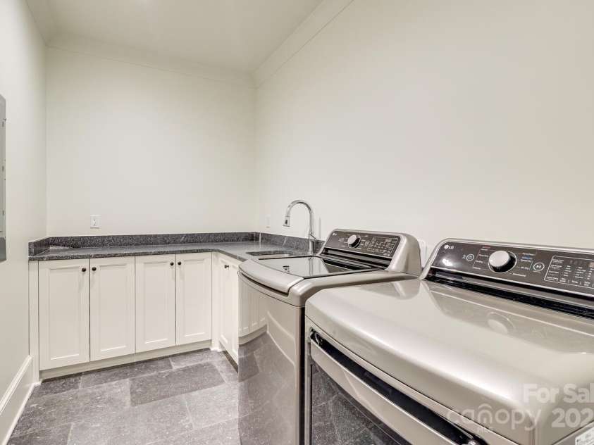 418 Ellsworth Road, Charlotte, NC 28211.  MLS# CAR4276851, YatesRealty ID 29139. Laundry room upstairs