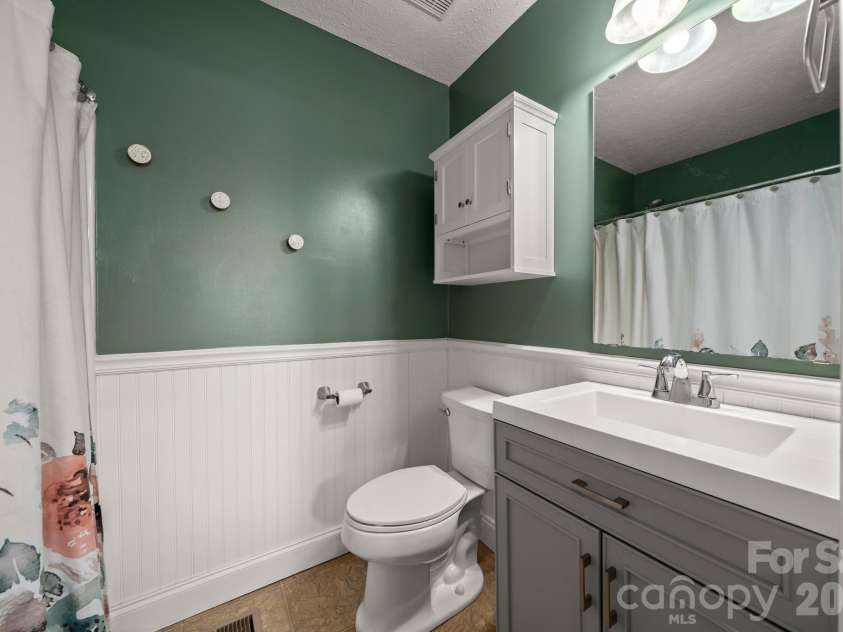 121 James Street, Clyde, NC 28721.  MLS# CAR4340631, YatesRealty ID 2914. Main Bathroom