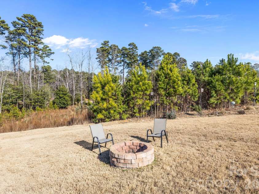 204 Old Harbor Drive, Mount Gilead, NC 27306.  MLS# CAR4335591, YatesRealty ID 2914. Fire Pit