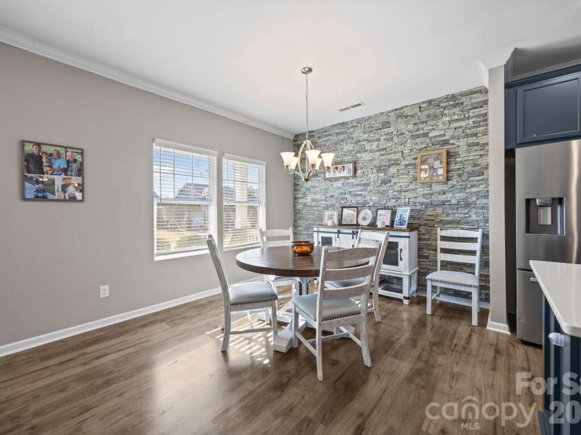 204 Old Harbor Drive, Mount Gilead, NC 27306.  MLS# CAR4335591, YatesRealty ID 2914. Owner added the stone accent wall in the dining area.