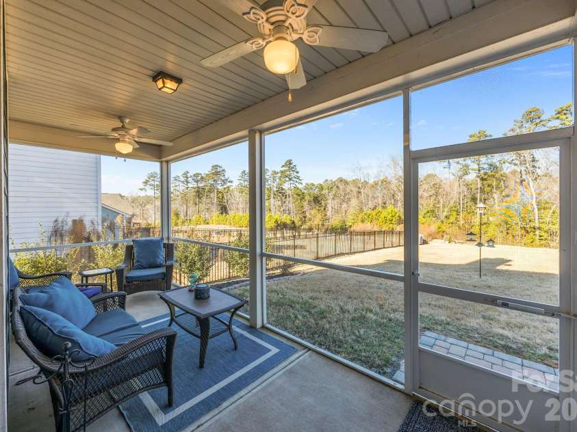 204 Old Harbor Drive, Mount Gilead, NC 27306.  MLS# CAR4335591, YatesRealty ID 2914. Screened Porch overlooking Huge Backyard