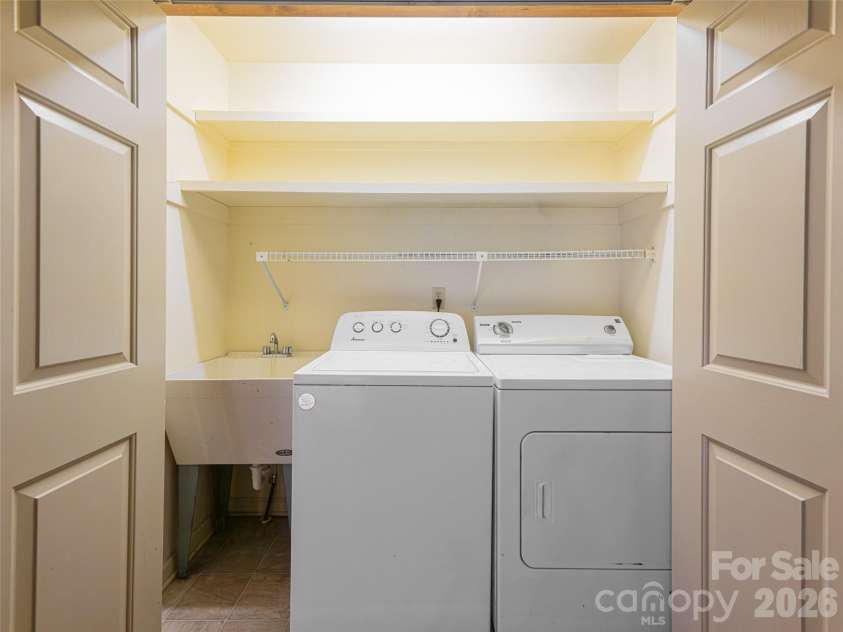 100 Wolf Shoals Drive, Hendersonville, NC 28739.  MLS# CAR4333977, YatesRealty ID 29146. Laundry area.