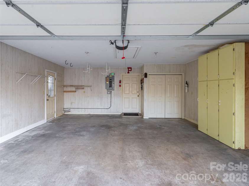 100 Wolf Shoals Drive, Hendersonville, NC 28739.  MLS# CAR4333977, YatesRealty ID 29146. Oversized garage with great storage.