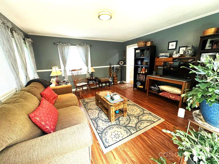 25 Norman Road, Fletcher, NC 28732.  MLS# CAR4278825, YatesRealty ID 29147. Den addition to house