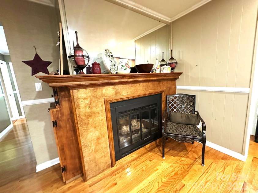 25 Norman Road, Fletcher, NC 28732.  MLS# CAR4278825, YatesRealty ID 29147. Gas log vented fireplace