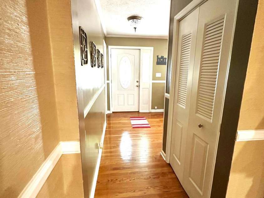 25 Norman Road, Fletcher, NC 28732.  MLS# CAR4278825, YatesRealty ID 29147. Hall to front door