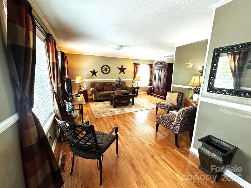 25 Norman Road, Fletcher, NC 28732.  MLS# CAR4278825, YatesRealty ID 29147. Living room