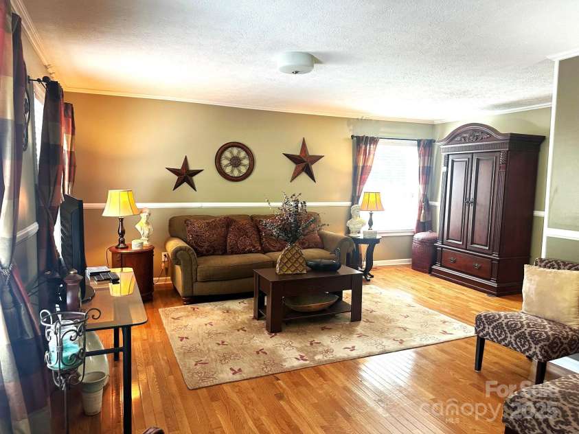 25 Norman Road, Fletcher, NC 28732.  MLS# CAR4278825, YatesRealty ID 29147. Living room