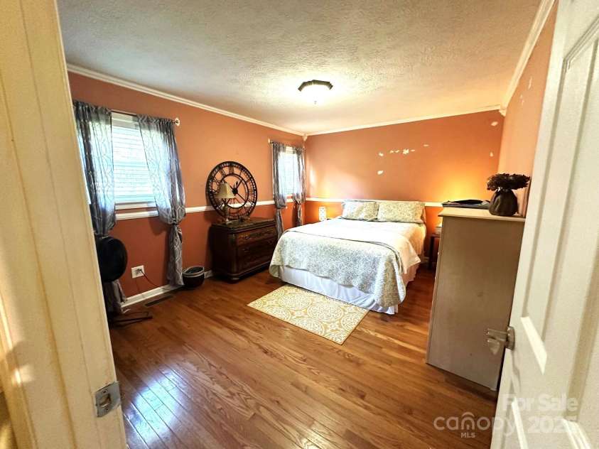 25 Norman Road, Fletcher, NC 28732.  MLS# CAR4278825, YatesRealty ID 29147. Primary bedroom