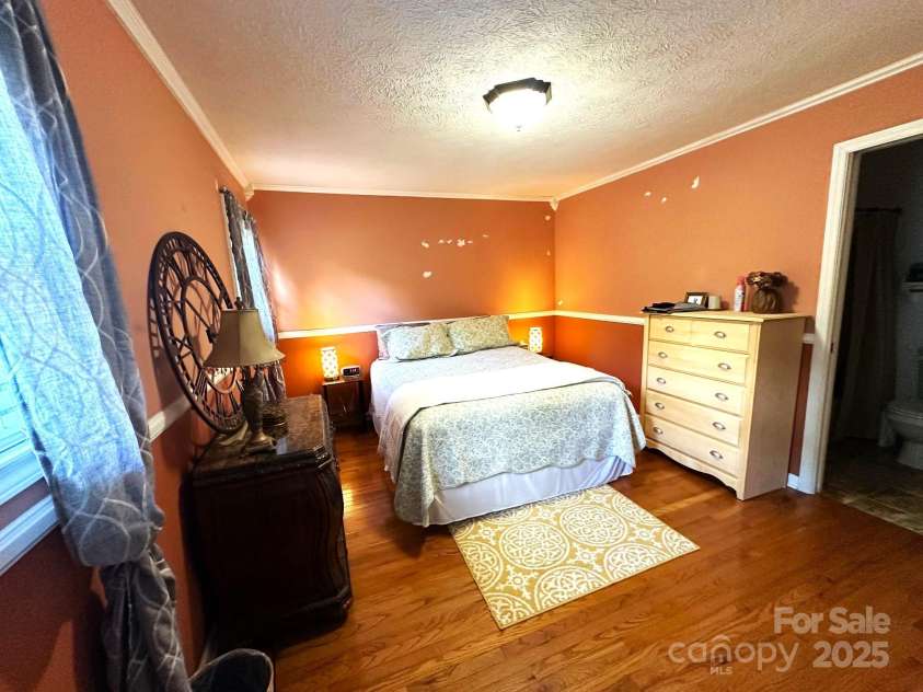 25 Norman Road, Fletcher, NC 28732.  MLS# CAR4278825, YatesRealty ID 29147. Primary bedroom