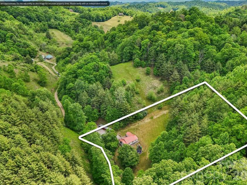 302 Battle Creek Drive, Green Mountain, NC 28740.  MLS# CAR4383357, YatesRealty ID 29147. 
