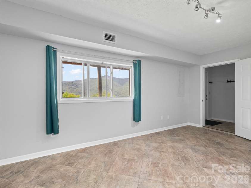 50 Blossom Drive, Waynesville, NC 28786.  MLS# CAR4390915, YatesRealty ID 29148. 