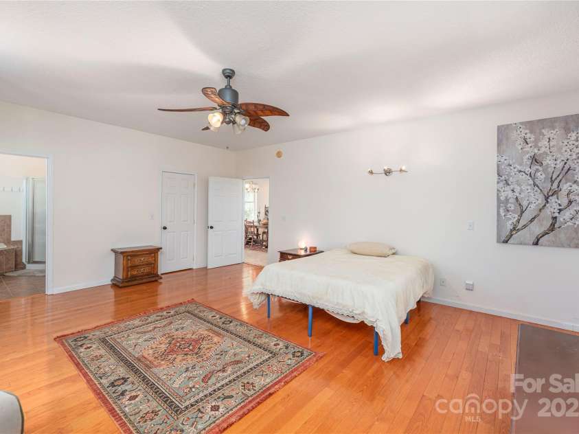 64 Wyoming Road, Asheville, NC 28803.  MLS# CAR4282768, YatesRealty ID 29149. Huge Primary Bedroom On Main (Off Dining Room)