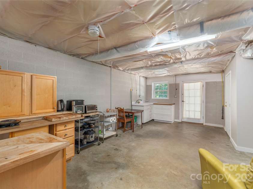 64 Wyoming Road, Asheville, NC 28803.  MLS# CAR4282768, YatesRealty ID 29149. Ready for an apartment, workshop or storage!