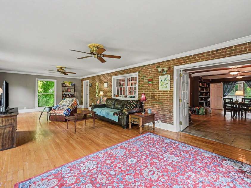 312 Windsor Drive, Shelby, NC 28150.  MLS# CAR4360104, YatesRealty ID 29151. Check out the exposed brick in the sunroom. This room can be accessed from the double doors off the living room...