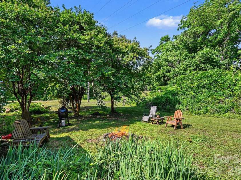 312 Windsor Drive, Shelby, NC 28150.  MLS# CAR4360104, YatesRealty ID 29151. Fire pit area in the back yard