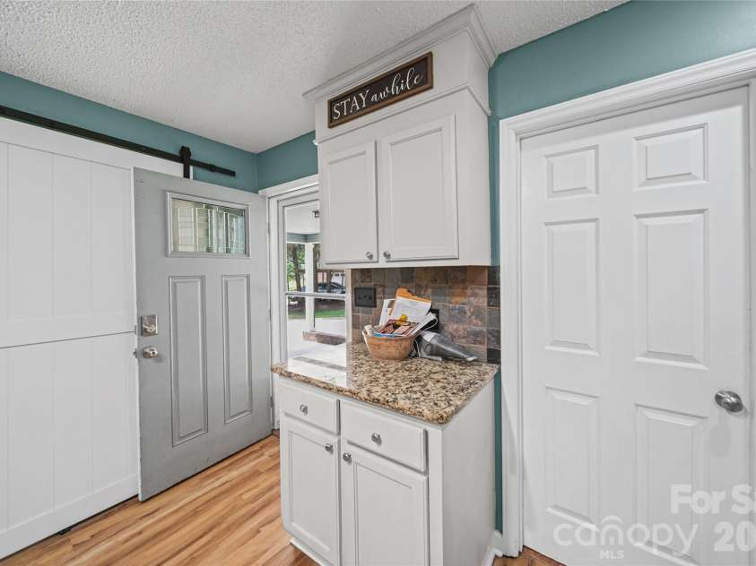 2600 Lakewood Drive, Gastonia, NC 28052.  MLS# CAR4368692, YatesRealty ID 29156. Side door access with coded door lock.