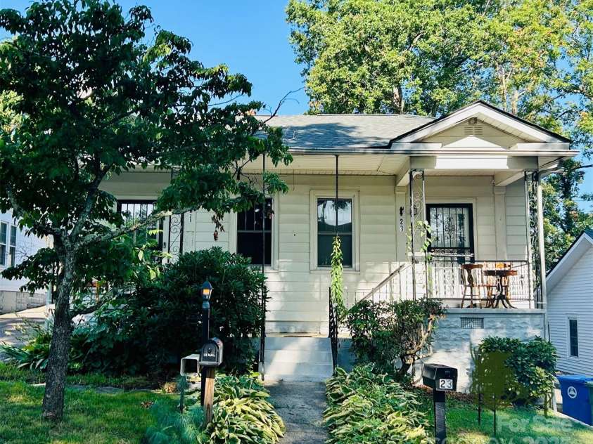 23 & 25 Oteen Park Place, Asheville, NC 28805.  MLS# CAR4287838, YatesRealty ID 29157. Charming character-rich duplex-style cottage in Asheville with a classic aesthetic and some nice modern updates.