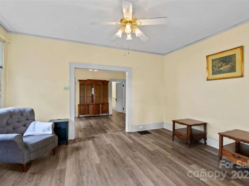 23 & 25 Oteen Park Place, Asheville, NC 28805.  MLS# CAR4287838, YatesRealty ID 29157. There is newer flooring in the living, dining room and hallway in unit 25.