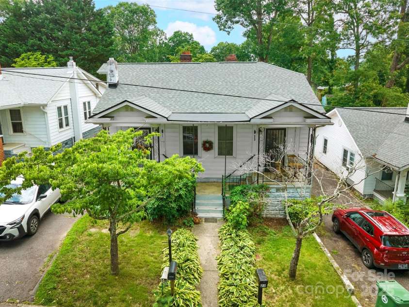 23 & 25 Oteen Park Place, Asheville, NC 28805.  MLS# CAR4287838, YatesRealty ID 29157. This home has a new roof (2024) and a lot of other items have been updated. t's ready for your finishing touches to call it home!