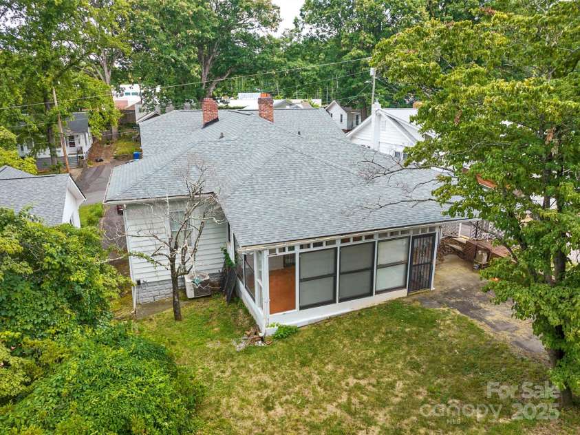 23 & 25 Oteen Park Place, Asheville, NC 28805.  MLS# CAR4287838, YatesRealty ID 29157. This house has a brand new roof installed in 2024!