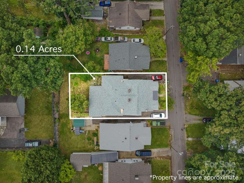 23 & 25 Oteen Park Place, Asheville, NC 28805.  MLS# CAR4287838, YatesRealty ID 29157. This is a low maintenance home with mature dogwood trees in the front yard. The back yard has an out door patio with a green space that's perfect for gardening.  There is a also a spacious enclosed patio where you