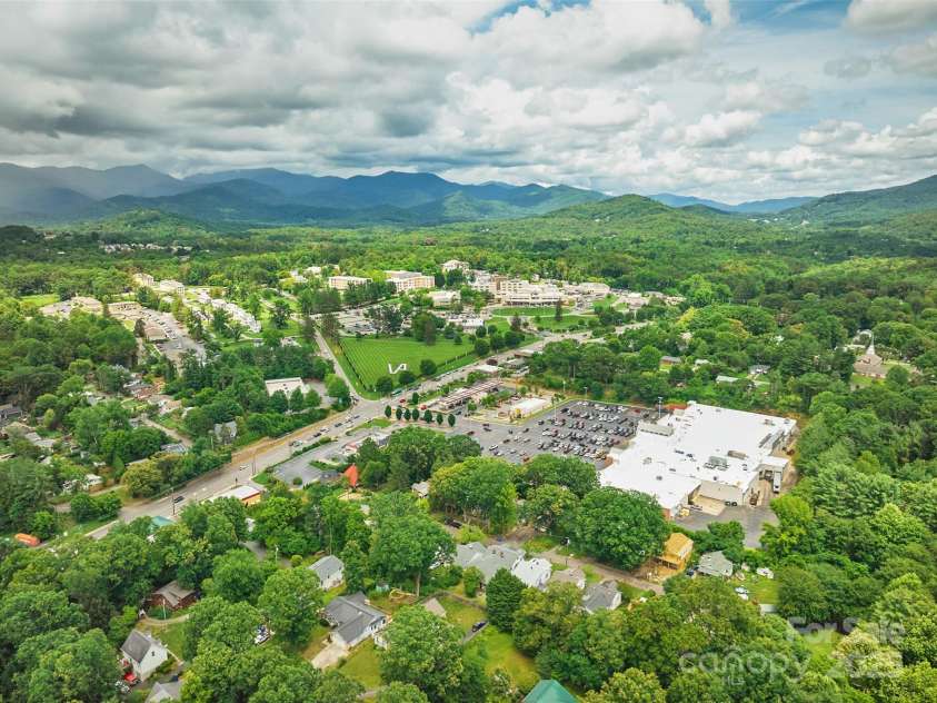 23 & 25 Oteen Park Place, Asheville, NC 28805.  MLS# CAR4287838, YatesRealty ID 29157. This is the neighborhood before the Ingles just after leaving downtown Asheville heading East. This image was taken from a drone. You can see the town of Black Mountain in the distance.