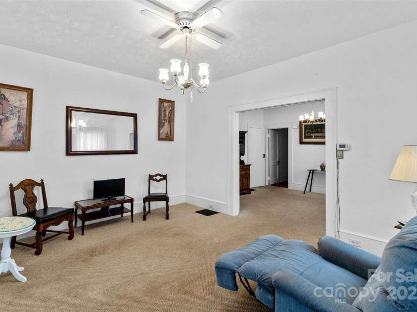 23 & 25 Oteen Park Place, Asheville, NC 28805.  MLS# CAR4287838, YatesRealty ID 29157. With some updated flooring in the open living room/dining room, it would feel like a new space!