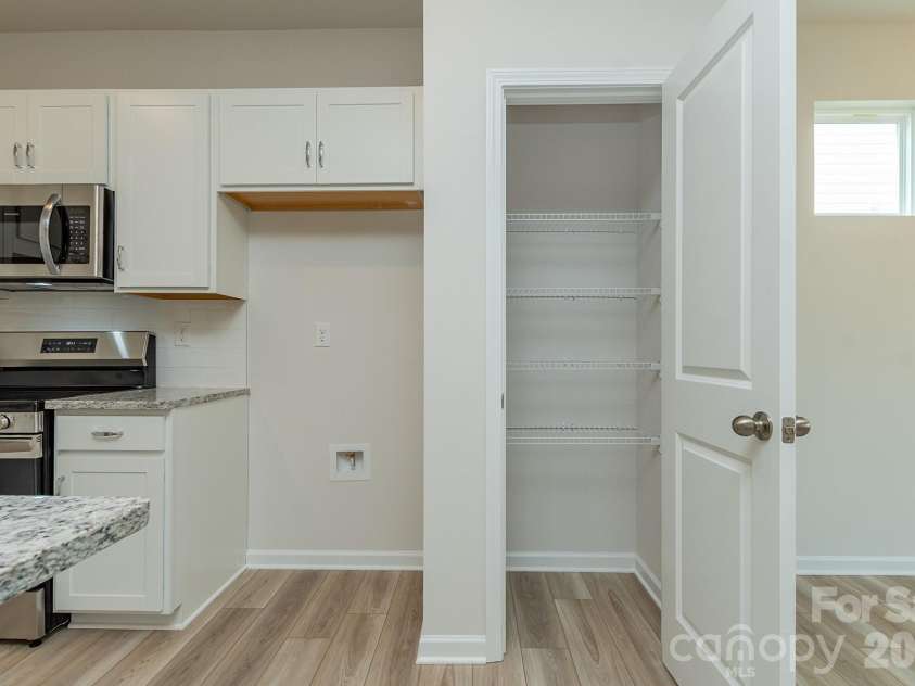 5617 Ringneck Road, Charlotte, NC 28216.  MLS# CAR4363350, YatesRealty ID 29157. Kitchen Pantry