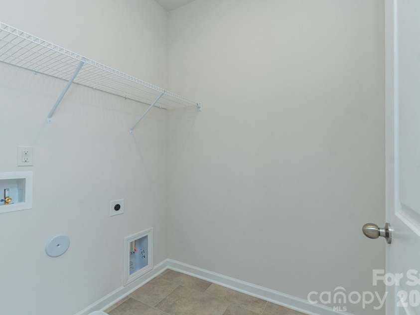 5617 Ringneck Road, Charlotte, NC 28216.  MLS# CAR4363350, YatesRealty ID 29157. Laundry