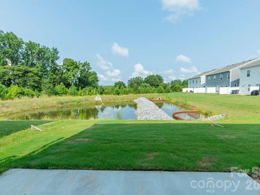 5617 Ringneck Road, Charlotte, NC 28216.  MLS# CAR4363350, YatesRealty ID 29157. Rear Patio
