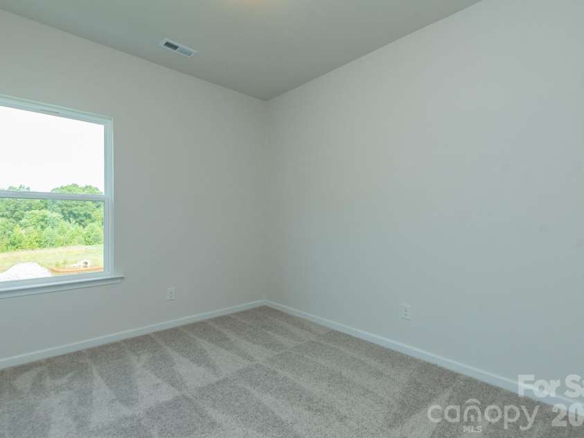 5617 Ringneck Road, Charlotte, NC 28216.  MLS# CAR4363350, YatesRealty ID 29157. Secondary Bedroom