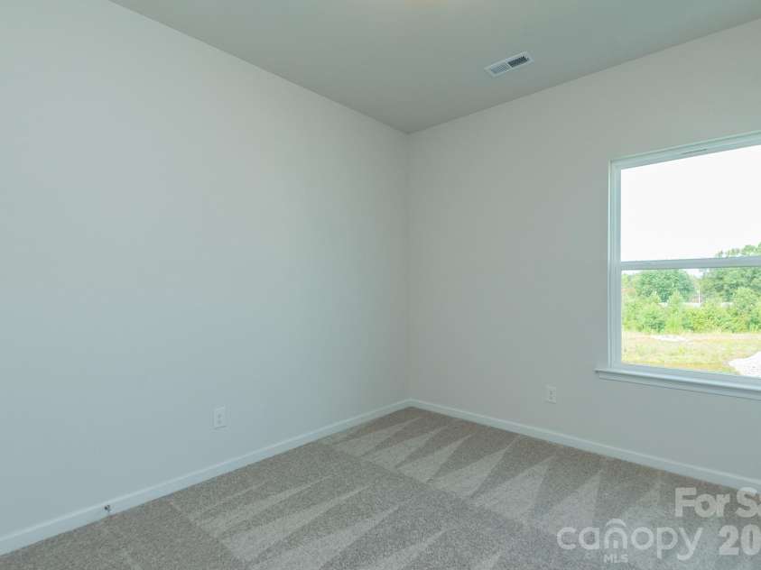 5617 Ringneck Road, Charlotte, NC 28216.  MLS# CAR4363350, YatesRealty ID 29157. Secondary Bedroom