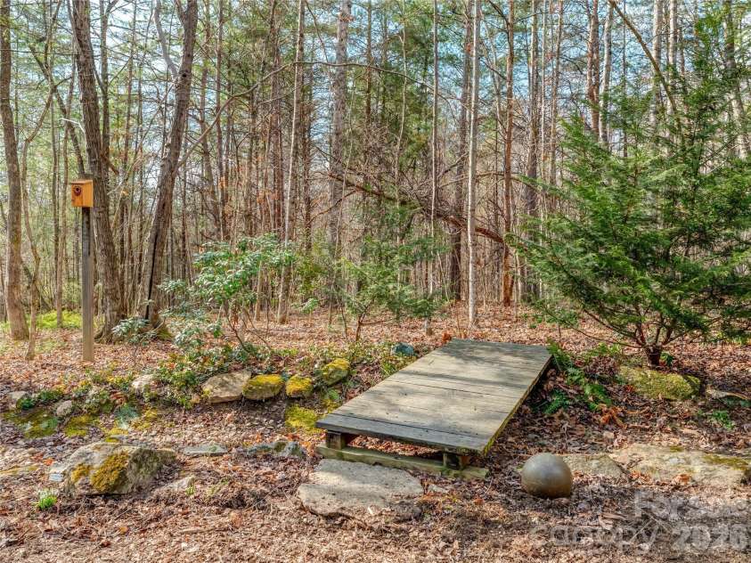 203 Heathcote Road, Hendersonville, NC 28791.  MLS# CAR4350178, YatesRealty ID 2916. Back yard