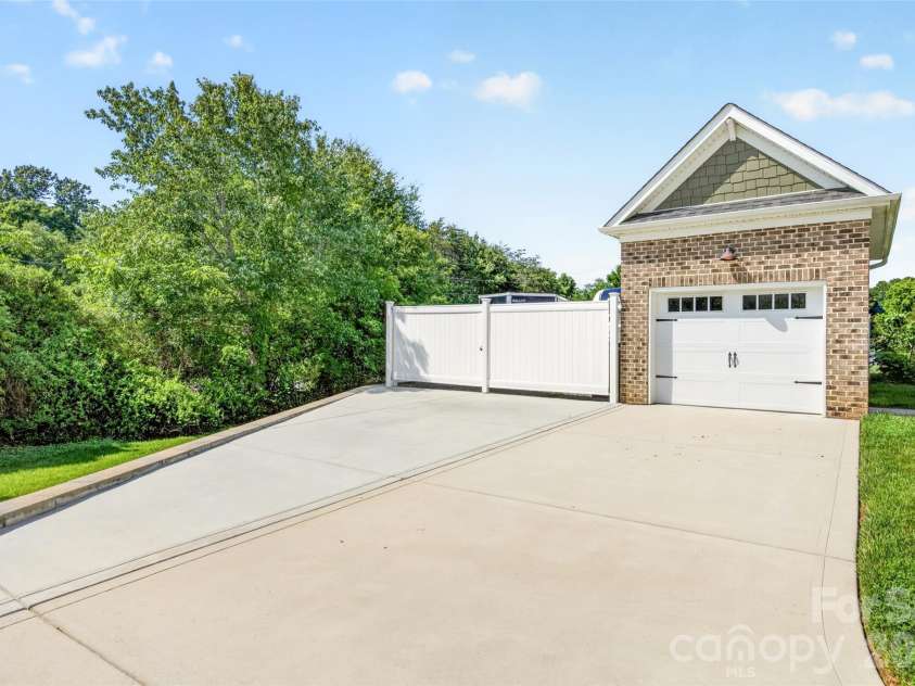 107 Buffalo Creek Drive, Statesville, NC 28677.  MLS# CAR4387757, YatesRealty ID 29161. Detached Garage with workshop. Separate 200-amp electrical panel service.