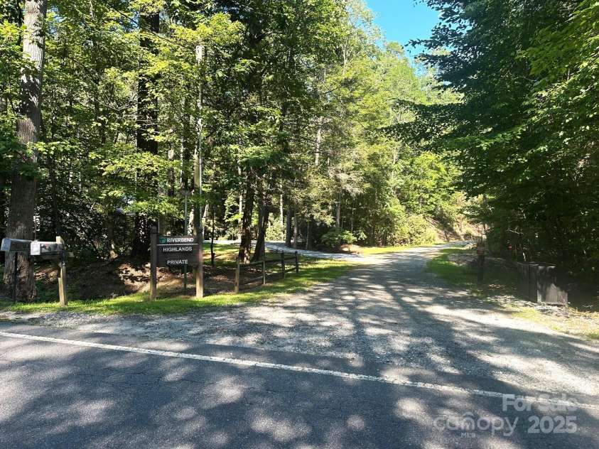 184 Poplar Drive, Lake Lure, NC 28746.  MLS# CAR4285241, YatesRealty ID 29166. Entrance to Riverbend Highlands off of Buffalo Creek Road