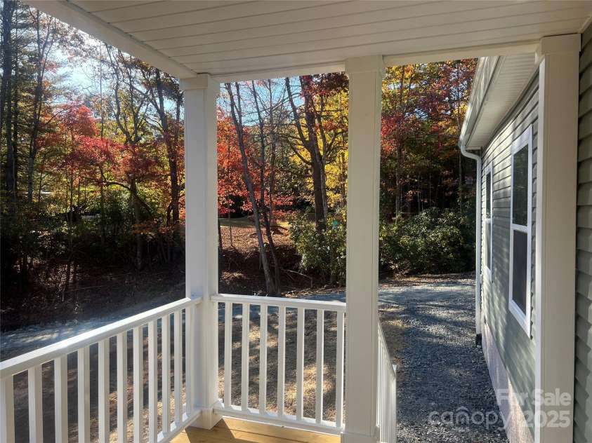 1663 Williamson Creek Road, Pisgah Forest, NC 28768.  MLS# CAR4194692, YatesRealty ID 29168. Welcoming front porch!