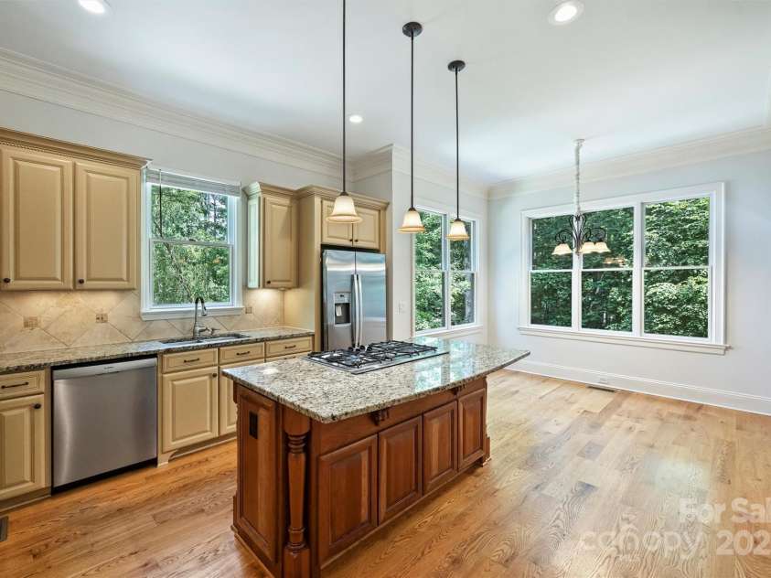 139 Callicutt Trail, Mooresville, NC 28117.  MLS# CAR4281844, YatesRealty ID 29172. Kitchen and Family Dining