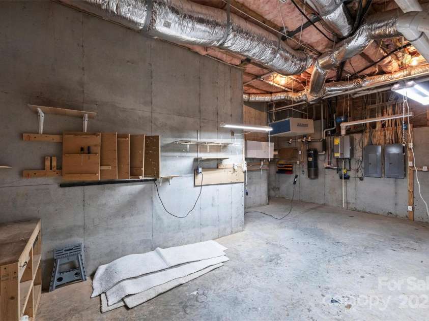 139 Callicutt Trail, Mooresville, NC 28117.  MLS# CAR4281844, YatesRealty ID 29172. Lower Level Workshop/Storage