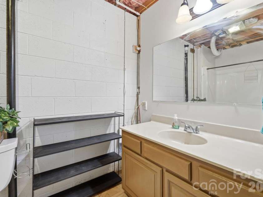 22 Webb Hill Road, Leicester, NC 28748.  MLS# CAR4386790, YatesRealty ID 29176. Basement full bath