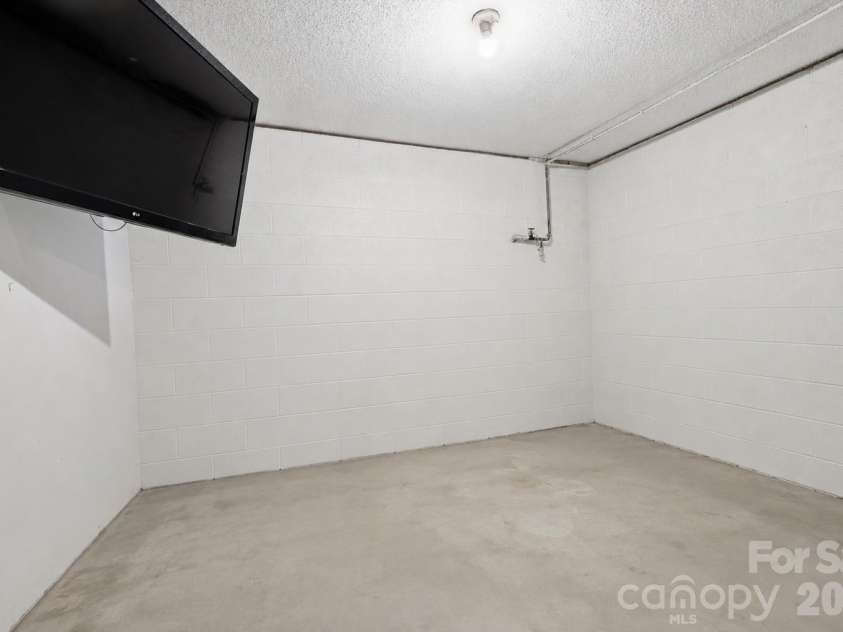 22 Webb Hill Road, Leicester, NC 28748.  MLS# CAR4386790, YatesRealty ID 29176. Basement room