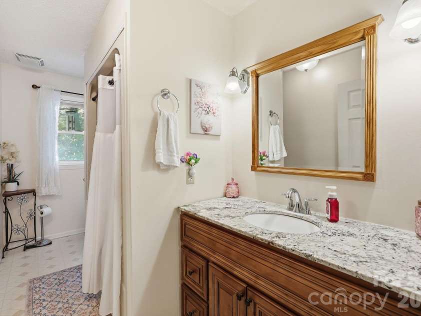 22 Webb Hill Road, Leicester, NC 28748.  MLS# CAR4386790, YatesRealty ID 29176. Full hall bathroom