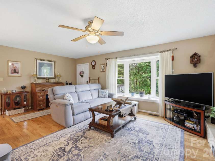 22 Webb Hill Road, Leicester, NC 28748.  MLS# CAR4386790, YatesRealty ID 29176. Living room