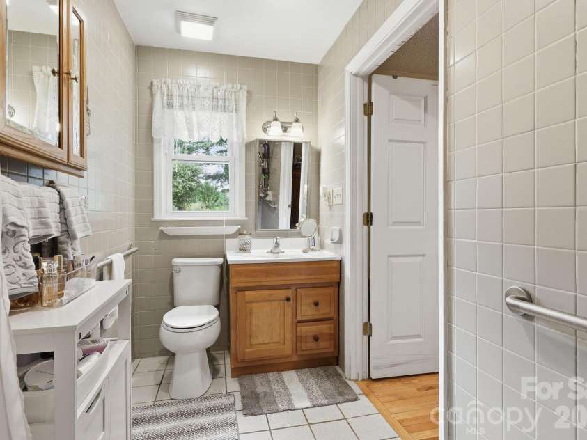 22 Webb Hill Road, Leicester, NC 28748.  MLS# CAR4386790, YatesRealty ID 29176. Primary bathroom