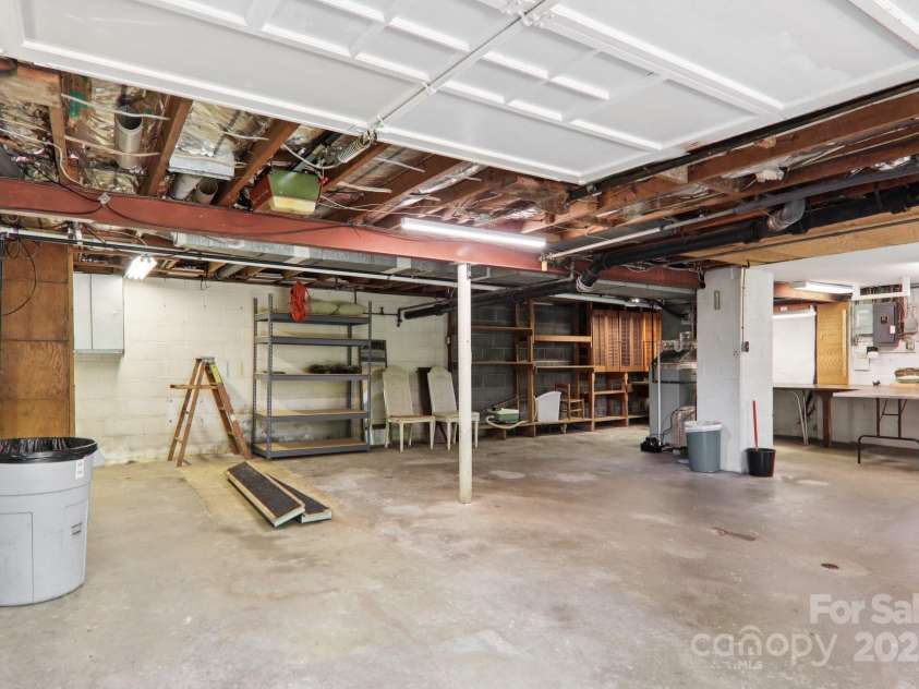 68 Mulberry Court, Arden, NC 28704.  MLS# CAR4283764, YatesRealty ID 29178. Clean, dry, unfinished basement w laundry
