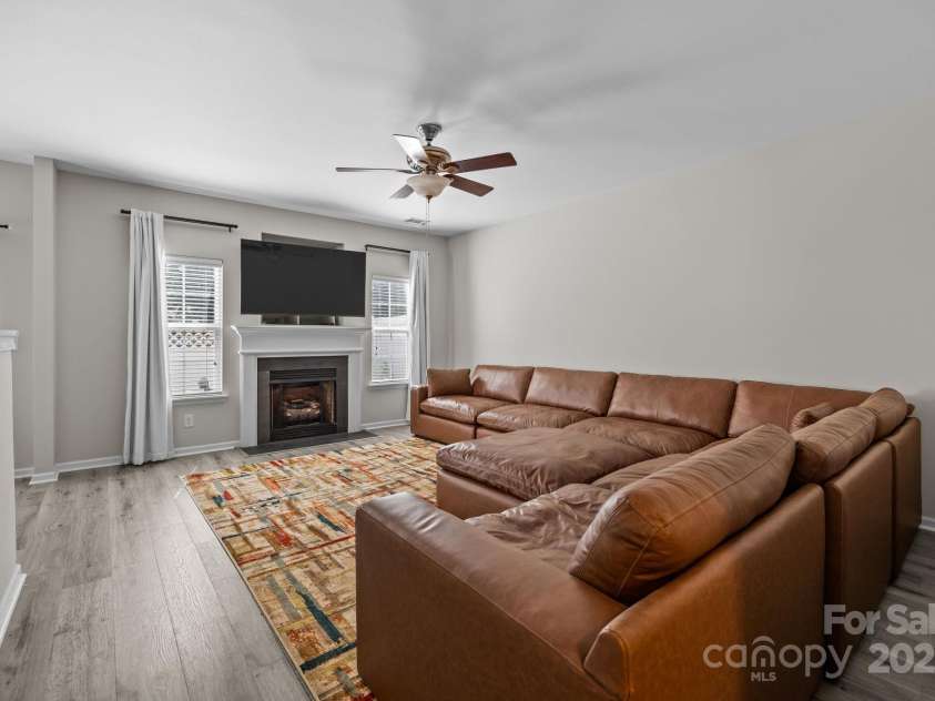 482 Delta Drive, Fort Mill, SC 29715.  MLS# CAR4282763, YatesRealty ID 29182. Great room with fireplace